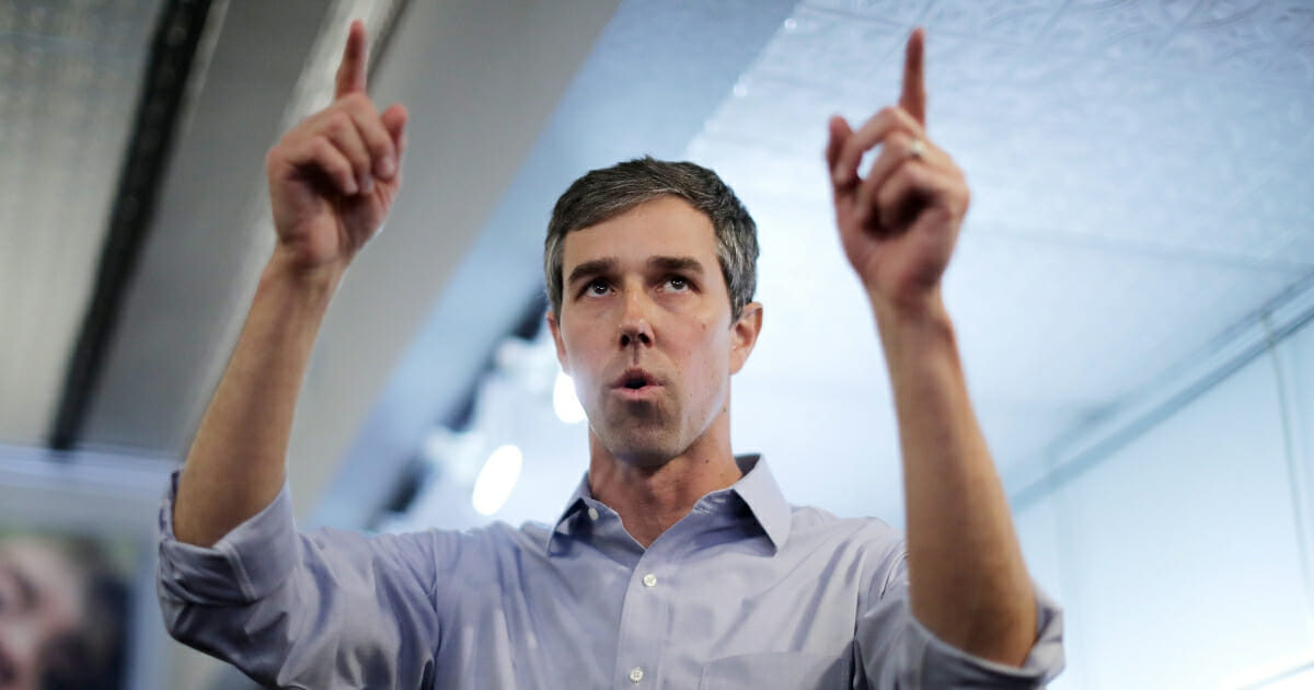 Democratic presidential candidate Beto O'Rourke talks with voters during his second day of campaigning for the 2020 nomination.