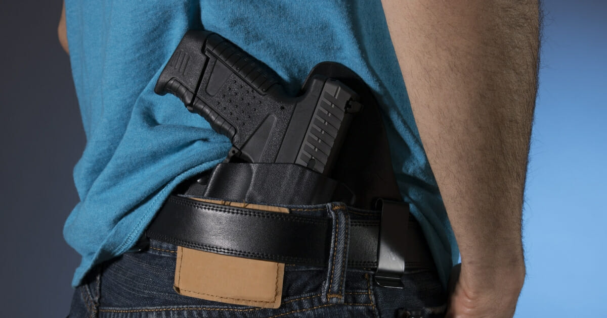 A handgun in a holster.