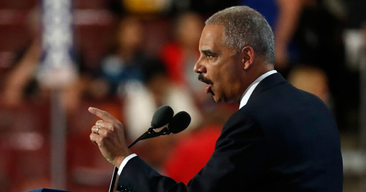 Former U.S. Attorney General Eric Holder delivers remarks on the second day of the Democratic National Convention at the Wells Fargo Center, July 26, 2016.