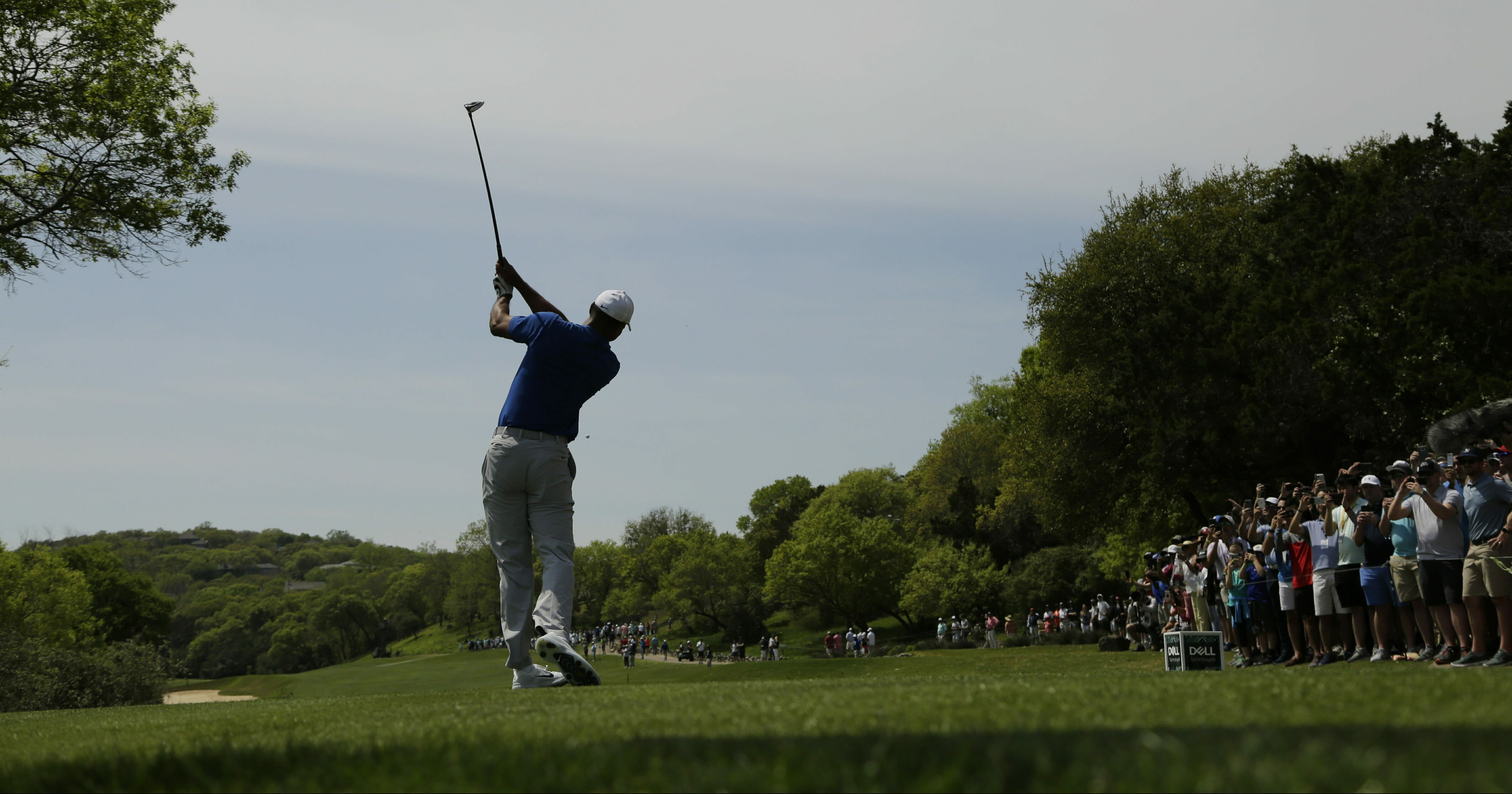 Tiger Woods hits his drive from the third tee during round-robin play at the Dell Match Play Championship golf tournament March 27, 2019, in Austin, Texas.