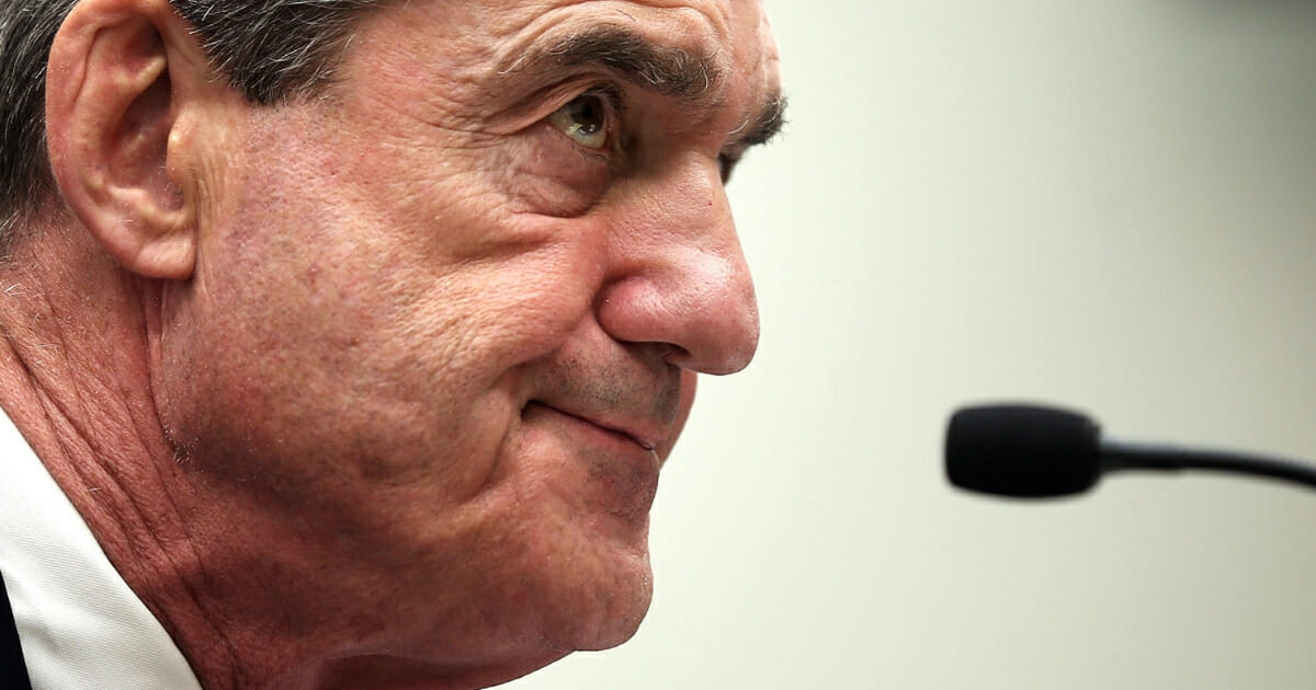 Federal Bureau of Investigation Director Robert Mueller testifies during a hearing before the House Judiciary Committee June 13, 2013 on Capitol Hill in Washington, DC.