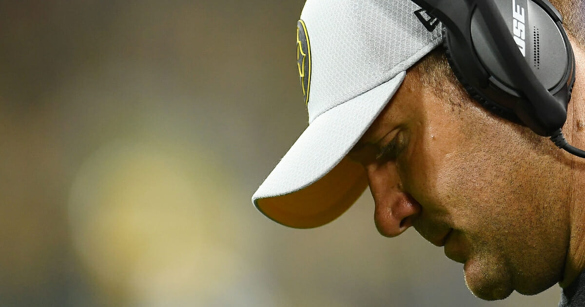Ben Roethlisberger of the Pittsburgh Steelers watches action during a preseason game against the Green Bay Packers at Lambeau Field on Aug. 16, 2018 in Green Bay, Wisconsin.