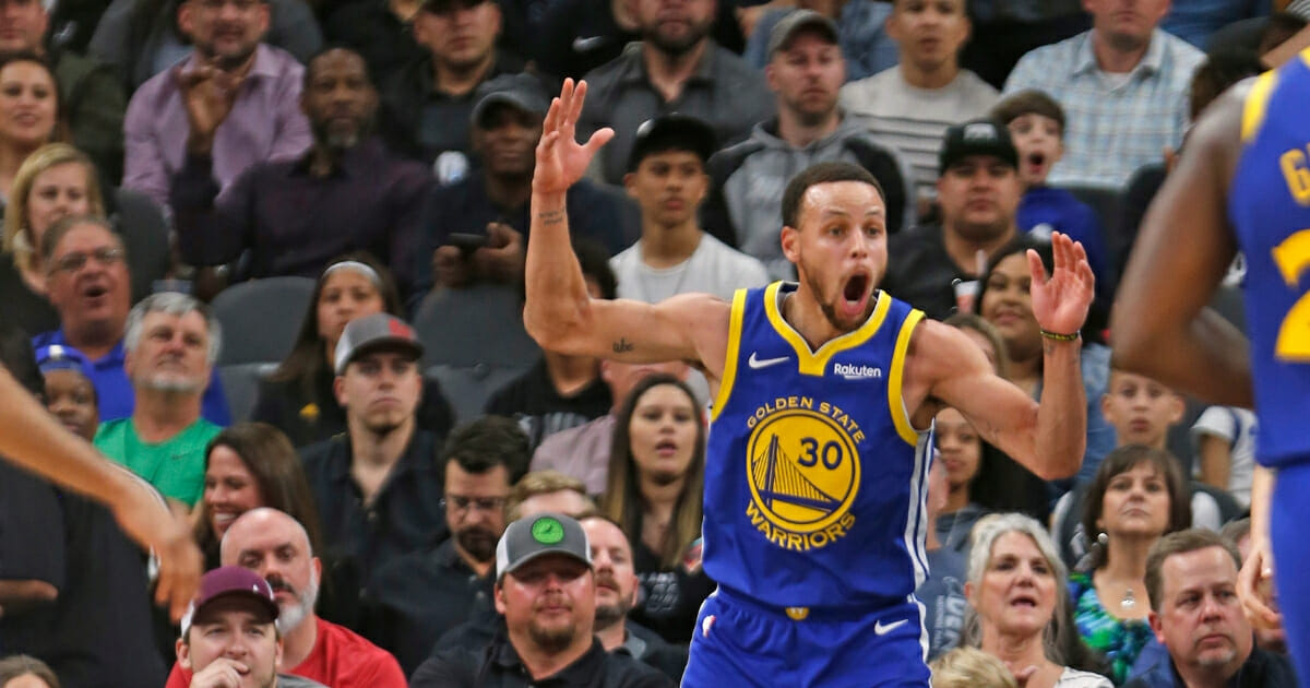 Stephen Curry of the Golden State Warriors reacts being called for a foul against the San Antonio Spurs at AT&T Center on March 18, 2019 in San Antonio.