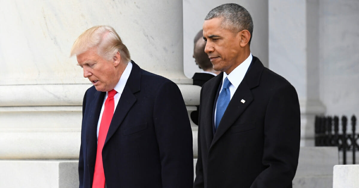 President Donald Trump and former President Barack Obama walk out prior to Obama's departure during the 2017 presidential inauguration at the U.S. Capitol.