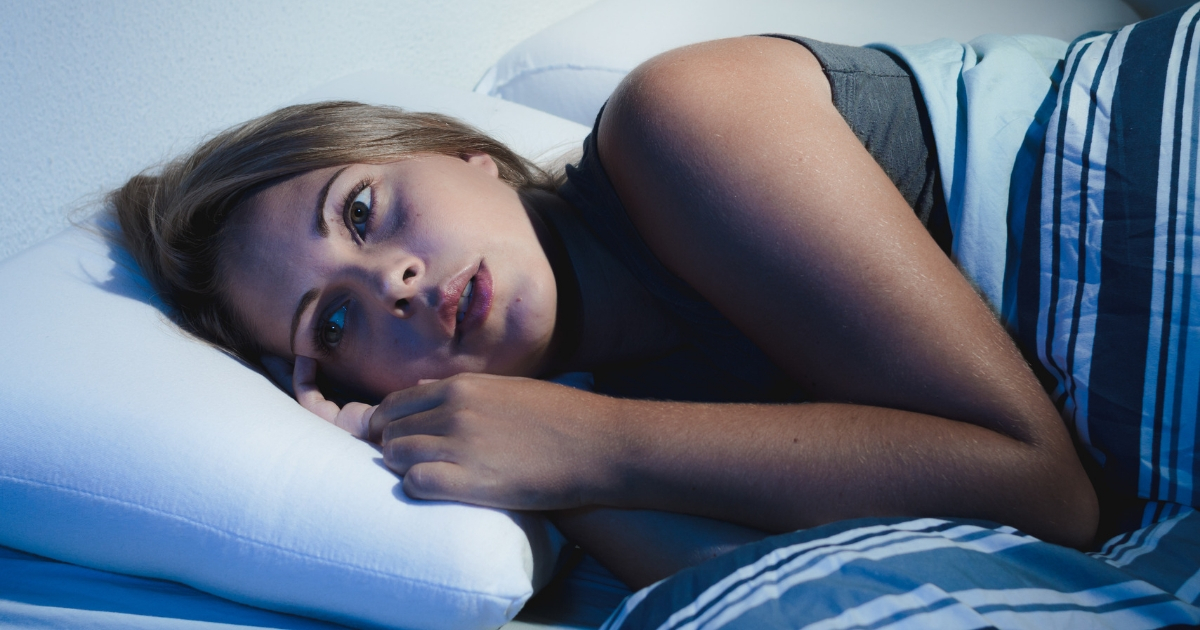 Young woman who is having trouble sleeping.