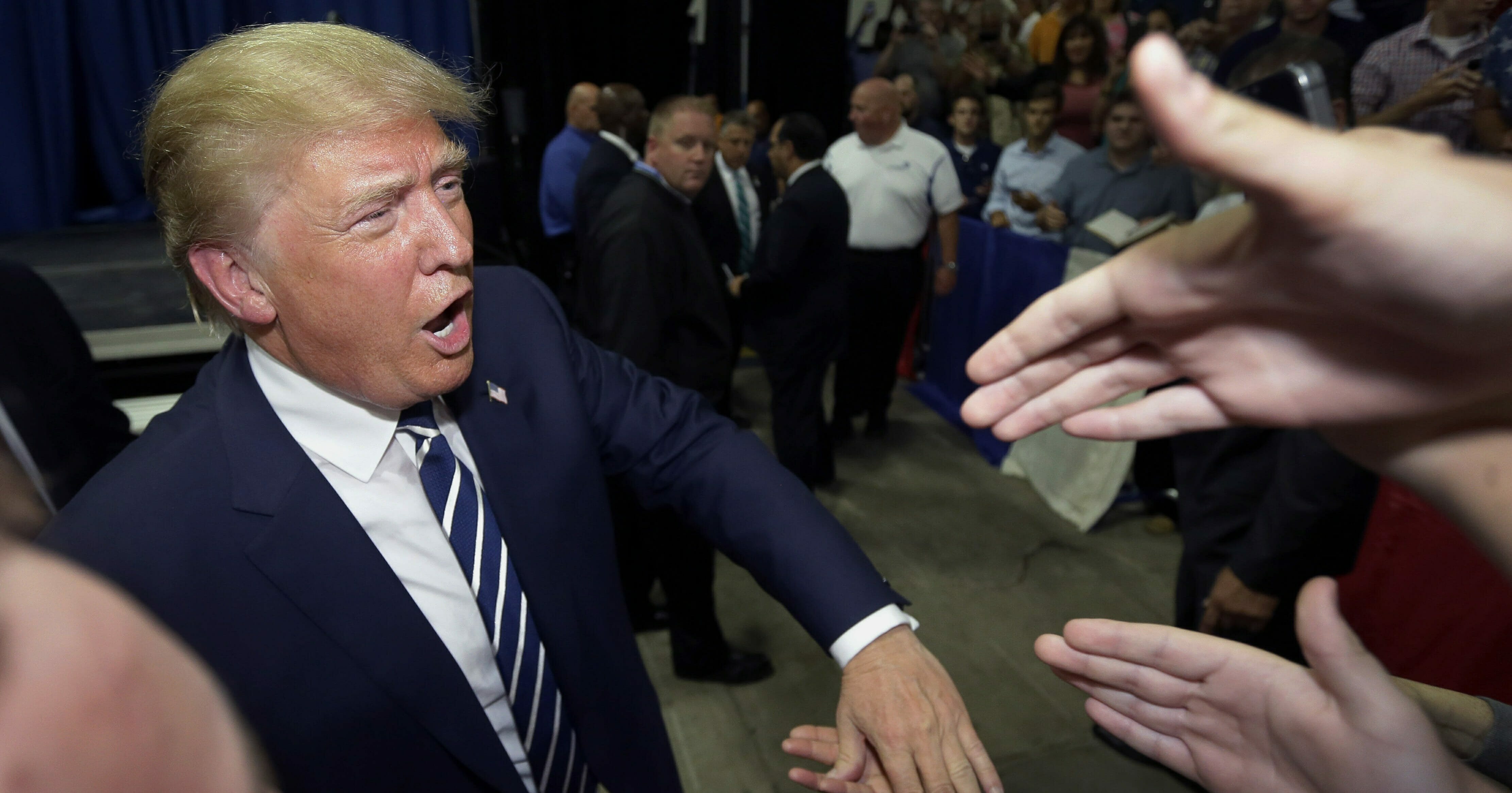 Donald Trump meets supporters after a GOP fundraising event in Birch Run, Mich., on Aug. 11, 2015.