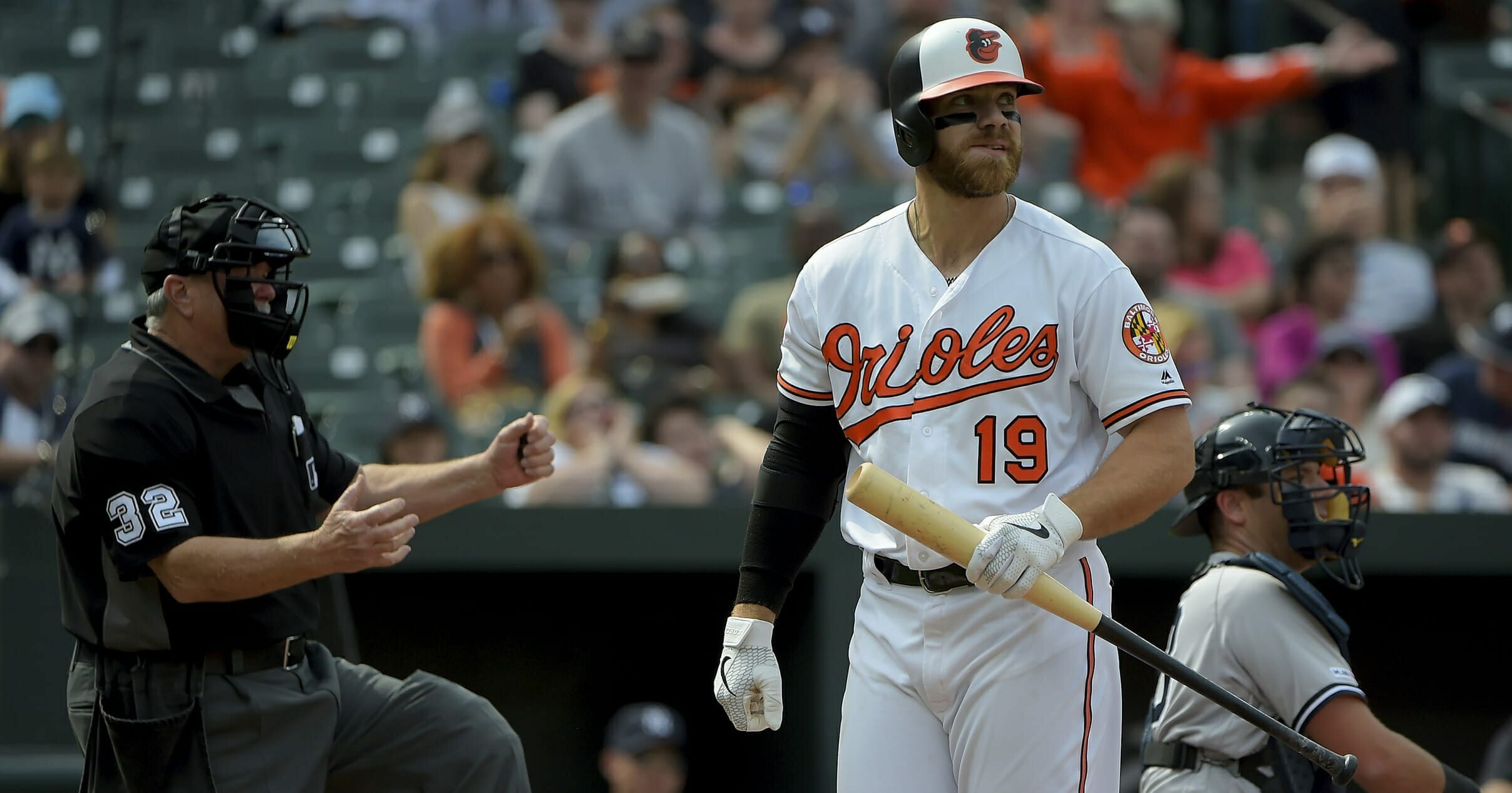 Baltimore Orioles first baseman Chris Davis reacts after striking out in the seventh inning of a baseball game against the New York Yankees, Sunday, April 7, 2019, in Baltimore.