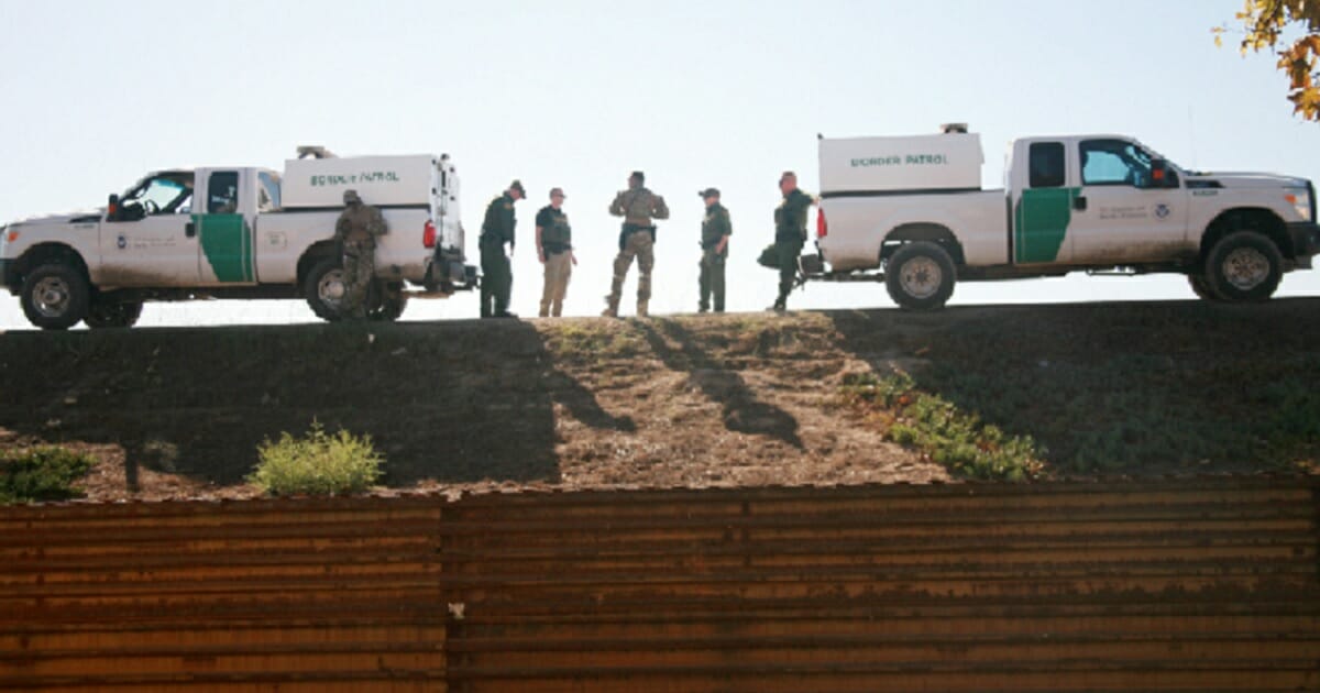 Border Patrol agents confer in a November 2018 file photo in San Ysidro, California.