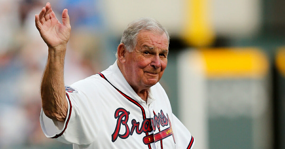 Former Atlanta Braves manager Bobby Cox waves to the crowd.