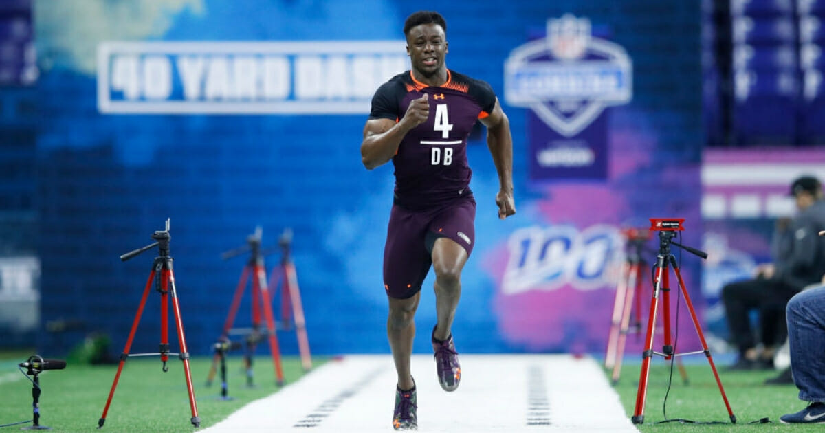 Defensive back Corey Ballentine runs the 40-yard dash at the NFL Combine on March 4, 2019, in Indianapolis. Ballentine, drafted by the New York Giants, was wounded during a Sunday shooting that killed his Washburn University teammate Dwane Simmons.