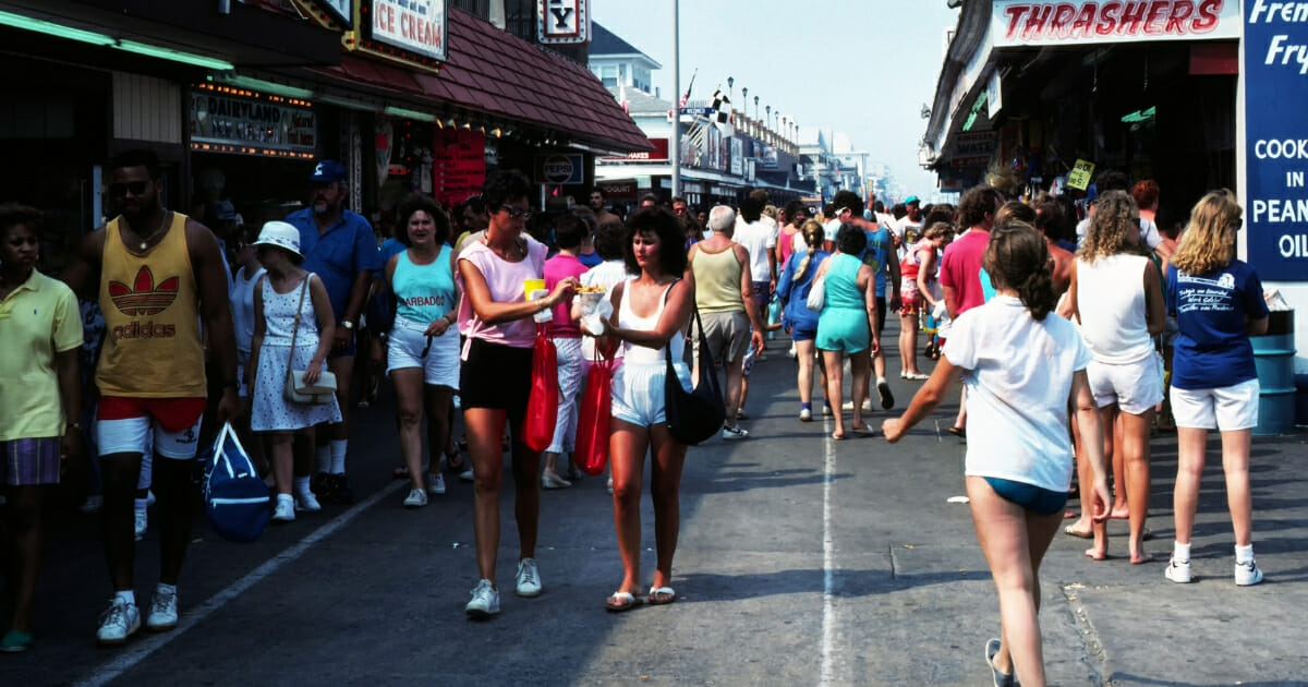 Pedestrians on the Ocean City Boardwalk in Maryland.
