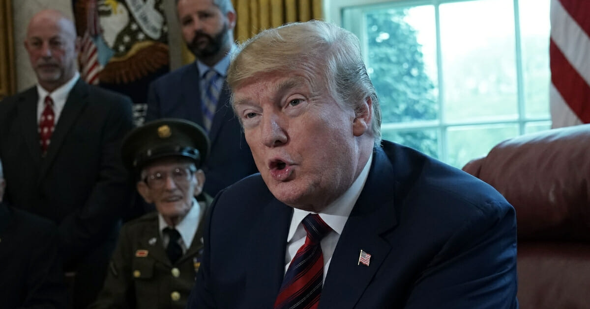 President Donald Trump speaks as he meets with World War II veterans in the Oval Office on April 11, 2019, in Washington, D.C.