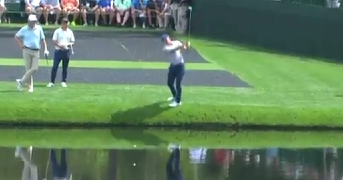 Jordan Spieth skips a shot off the water during the Masters' Par 3 contents Wednesday, April 10, 2019, in Augusta, Ga.
