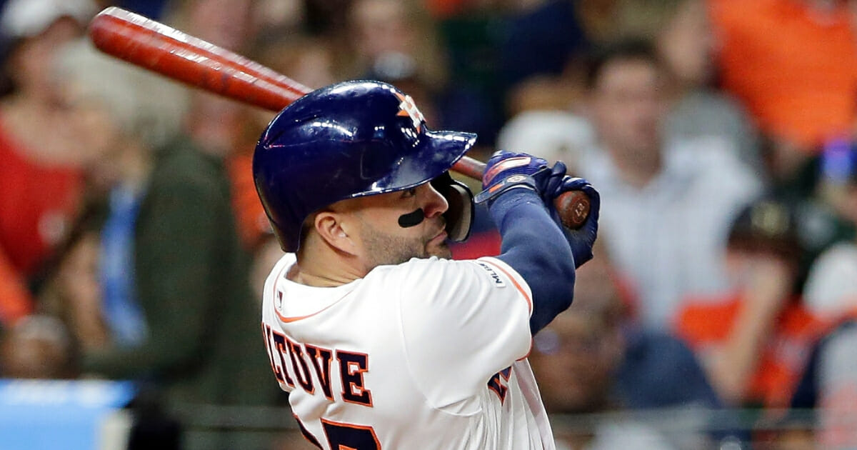 Astros' second baseman Jose Altuve watches his second home run during the fifth inning against the New York Yankees on Wednesday, April 10, 2019, in Houston.