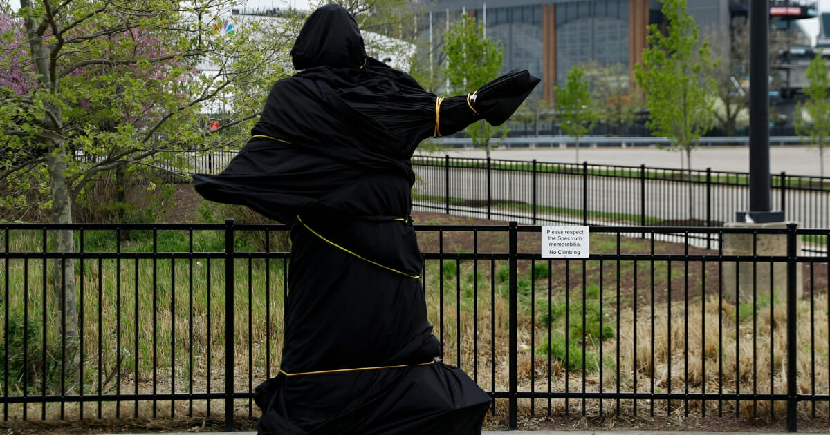 A covered statue of singer Kate Smith is seen near the Wells Fargo Center in Philadelphia on April 19, 2019.