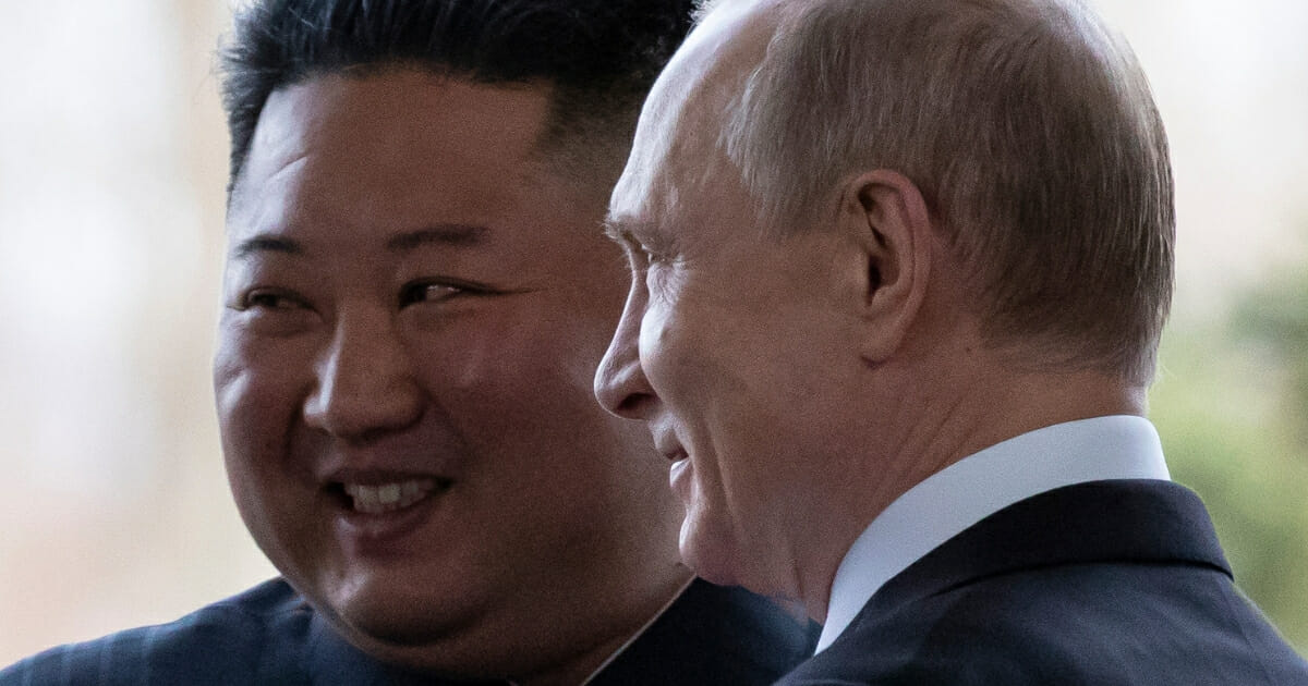 Russian President Vladimir Putin, right, welcomes North Korean leader Kim Jong Un.