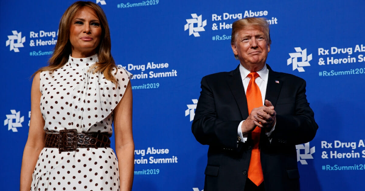 President Donald Trump and first lady Melania Trump speak at the Rx Drug Abuse and Heroin Summit on April 24, 2019, in Atlanta.