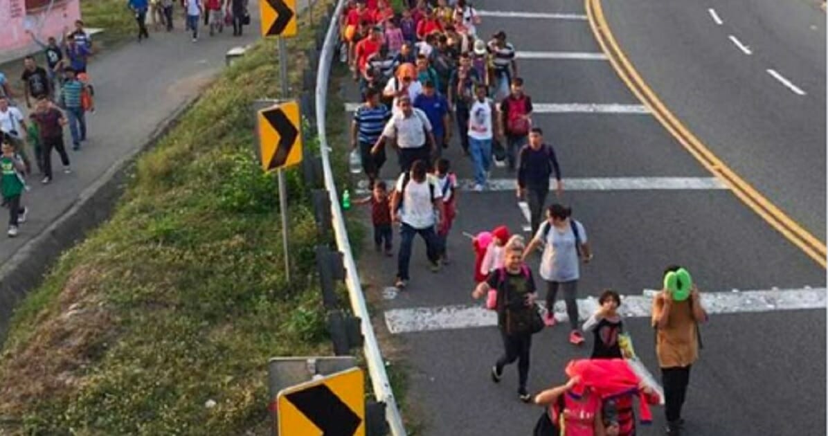A migrant caravan heads north through southern Mexico on Saturday.