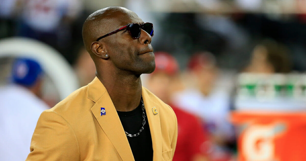 2018 Hall of Fame inductee Terrell Owens speaks during a ceremony at halftime of the game between the San Francisco 49ers and the Oakland Raiders at Levi's Stadium on Nov. 1, 2018 in Santa Clara, California.