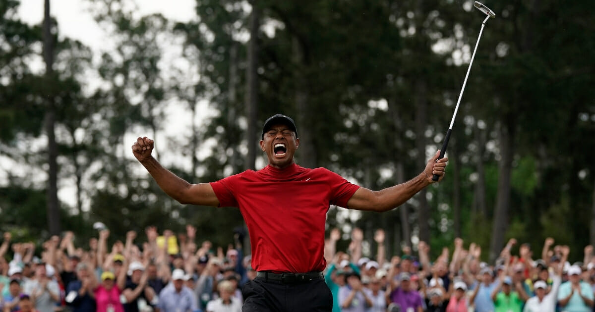 Tiger Woods reacts as he wins the Masters tournament Sunday, April 14, 2019, in Augusta, Ga.
