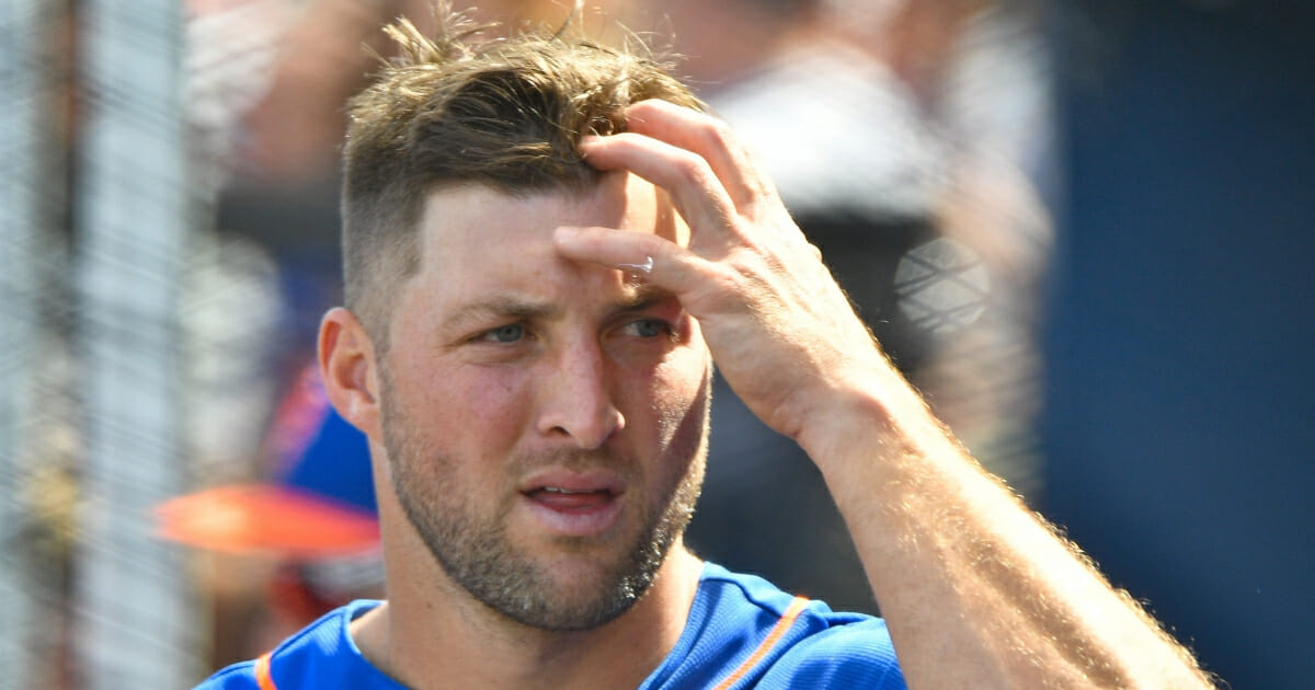 Tim Tebow in the dugout during a spring training game March 7, 2019, in West Palm Beach, Fla.