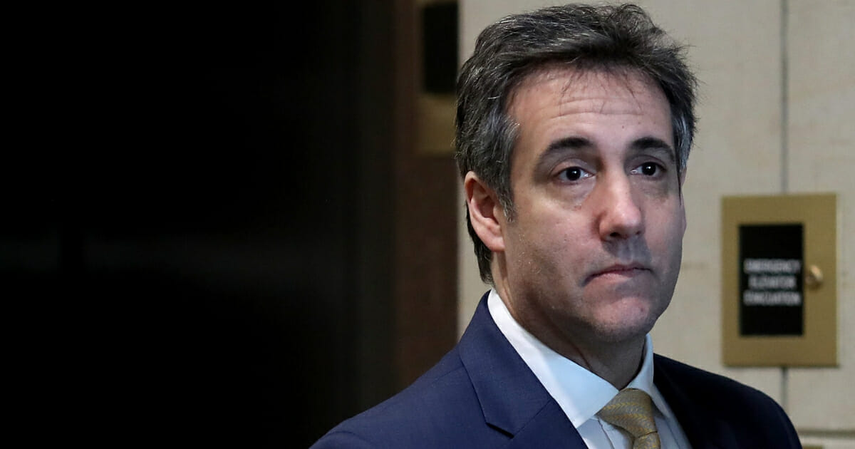 Michael Cohen, former private attorney for President Donald Trump, is pictured in a file photo from February arriving for a closed hearing before the House Intelligence Committee at the U.S. Capitol. Cohen is now scheduled to begin serving a three-year sentence in May after pleading guilty to tax evasion and other charges.