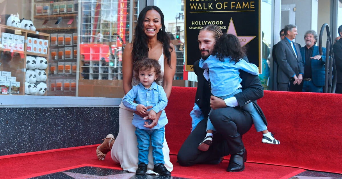 "Guardians of the Galaxy" star Zoe Saldana and her husband, Marc Perego, are pictured with the couple's three boys at Saldana's Walk of Fame ceremony in Hollywood in May.