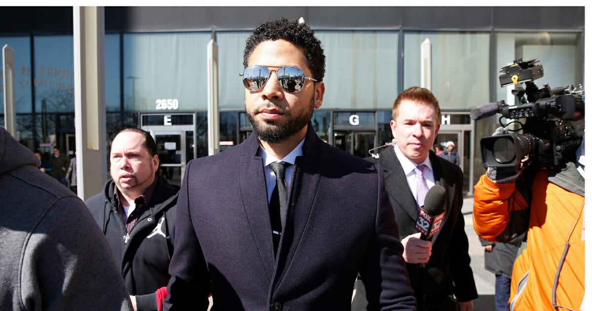 Actor Jussie Smollett leaves a March 26 court appearance in Chicago.