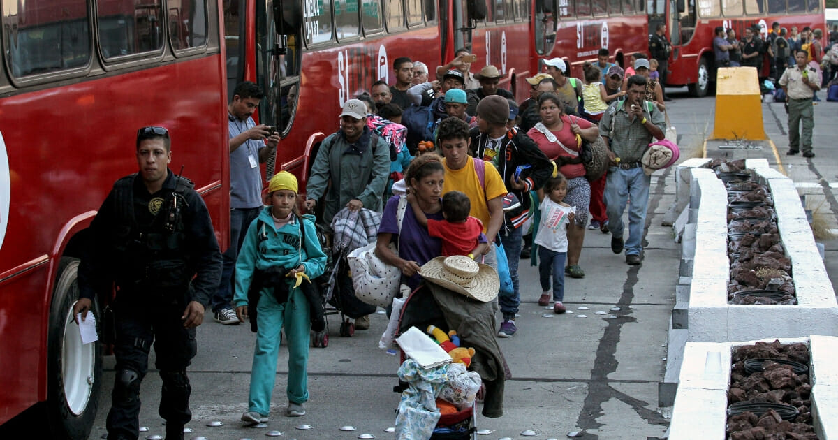 Central American migrants -mostly Hondurans- moving in a caravan towards the United States.