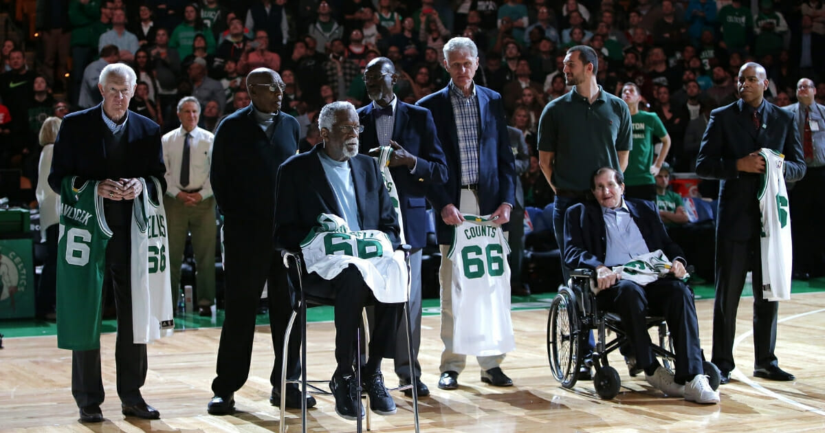 Members of the 1966 Boston Celtics Championship team are honored on the court at halftime of the game between the Boston Celtics and the Miami Heat at TD Garden on April 13, 2016 in Boston.