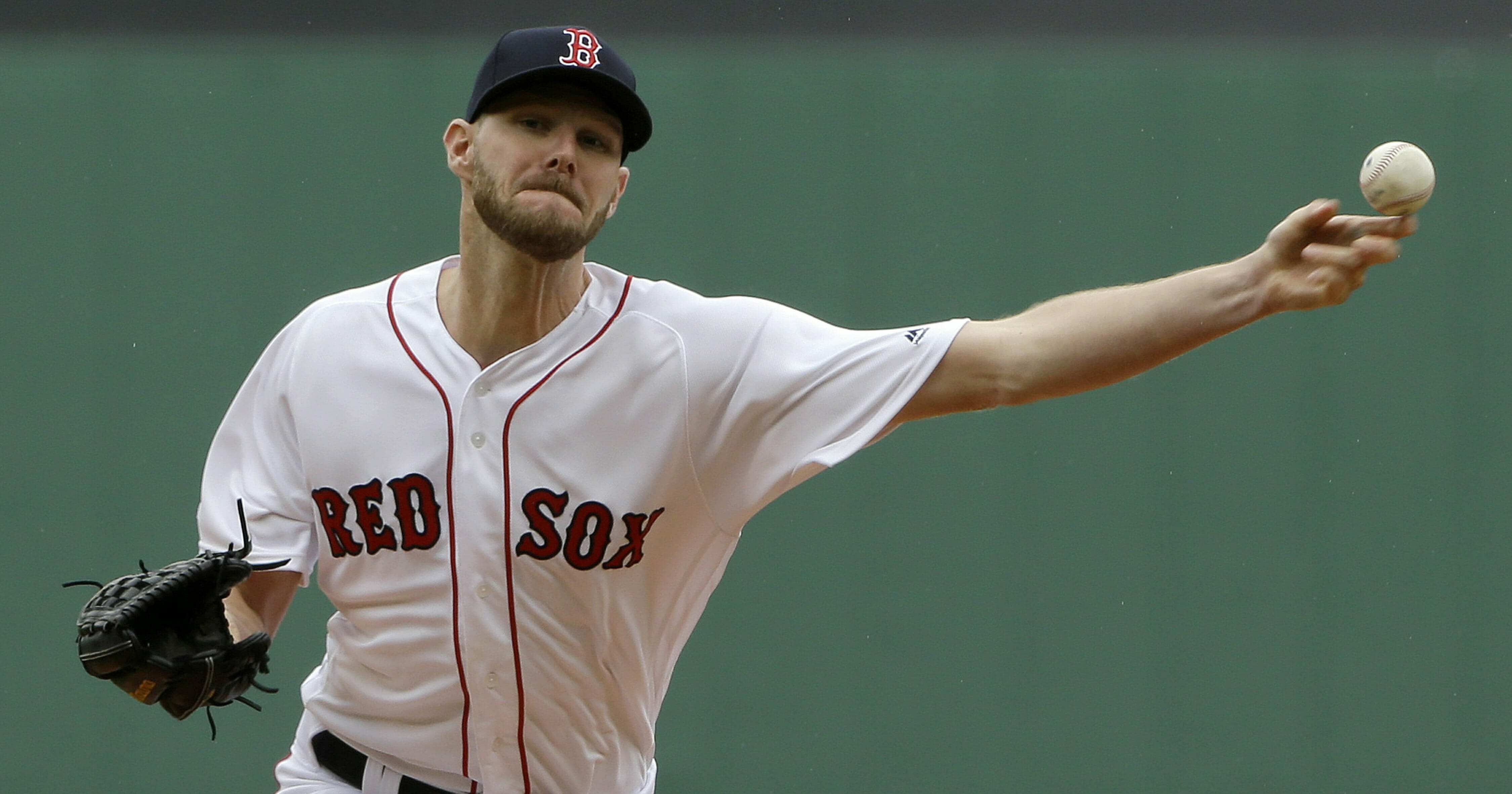 Boston Red Sox's Chris Sale delivers a pitch against the Tampa Bay Rays during the first inning of a baseball game at Fenway Park, Sunday, April 28, 2019, in Boston.