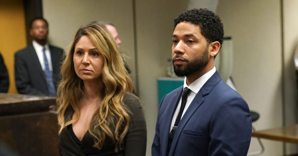 Actor Jussie Smollett attends Leighton Criminal Court with his attorney Tina Glandian (left) on March 14, 2019, in Chicago.