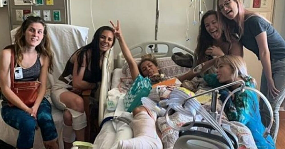 Waitress recovers from injuries after jumping off pier to save boy.