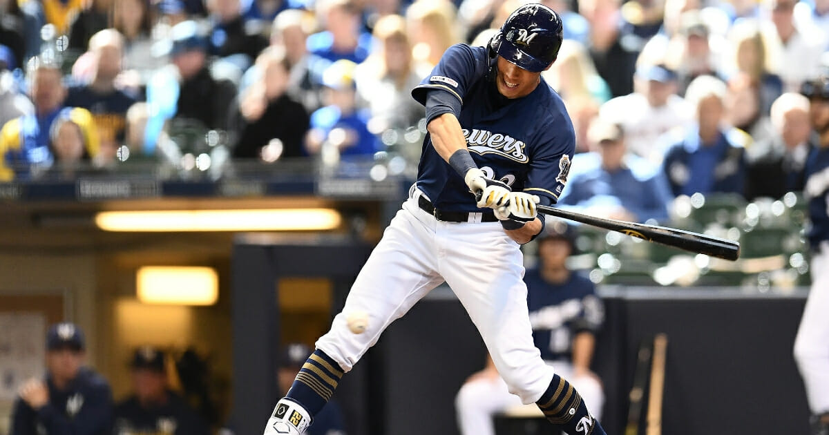 Christian Yelich of the Milwaukee Brewers at bat during a game against the St. Louis Cardinals at Miller Park on March 31, 2019 in Milwaukee.