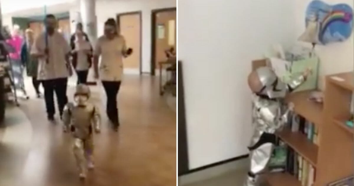 Little girl marches through hospital in stormtrooper outfit to ring the cancer bell