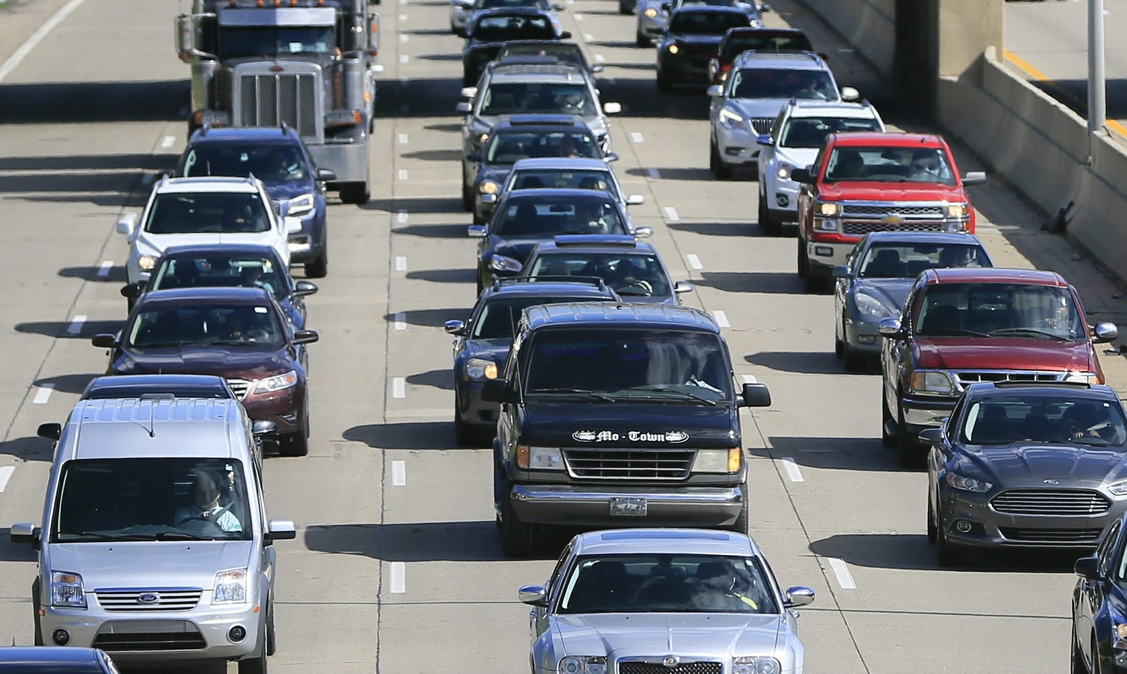 In a June 23, 2015, file photo, traffic heads north along the Lodge freeway in Detroit. Michigan.