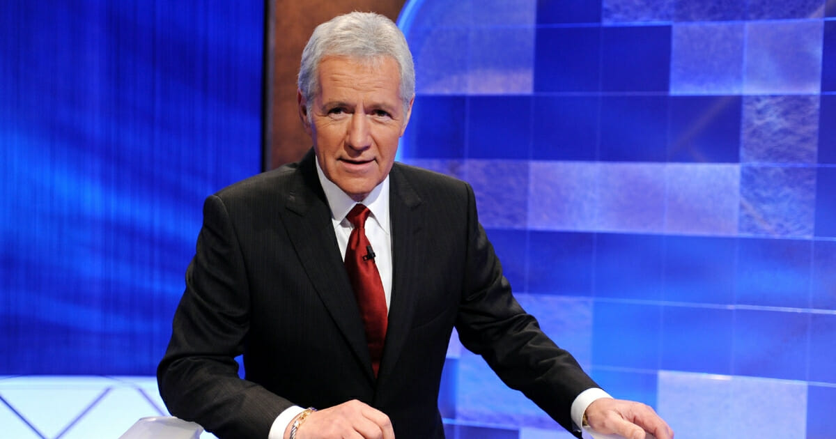 Game show host Alex Trebek poses on the set of the "Jeopardy!" Million Dollar Celebrity Invitational Tournament show taping on April 17, 2010 in Culver City, California.
