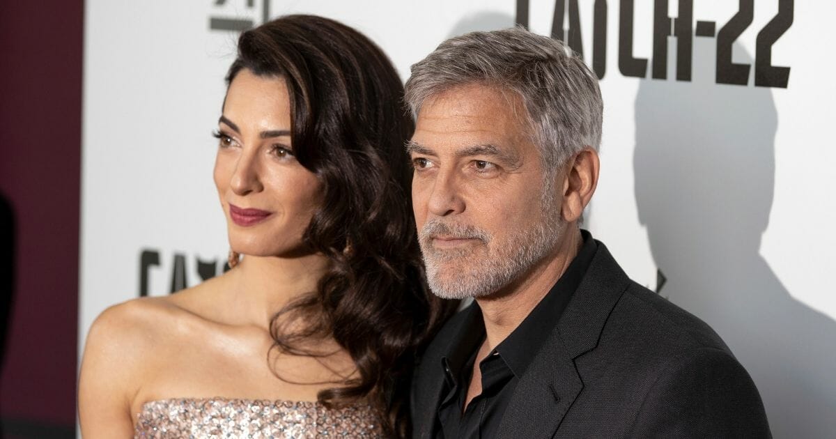 Amal and George Clooney at the premiere of "Catch 22" in London, on May 15, 2019.
