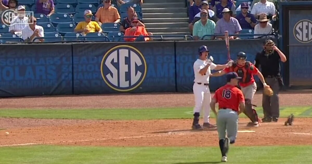 Auburn catcher Matt Scheffler looks for the ball in the ninth inning of the Tigers' SEC tournament game against LSU.