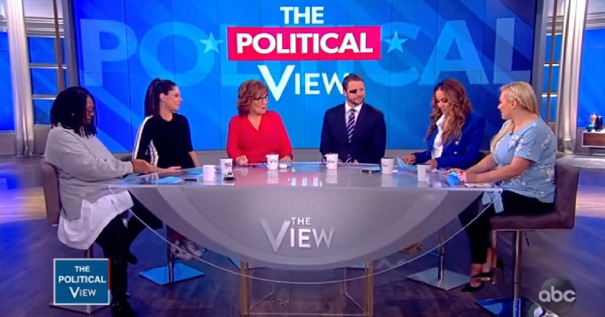 Rep. Dan Crenshaw with "The View" panelists.