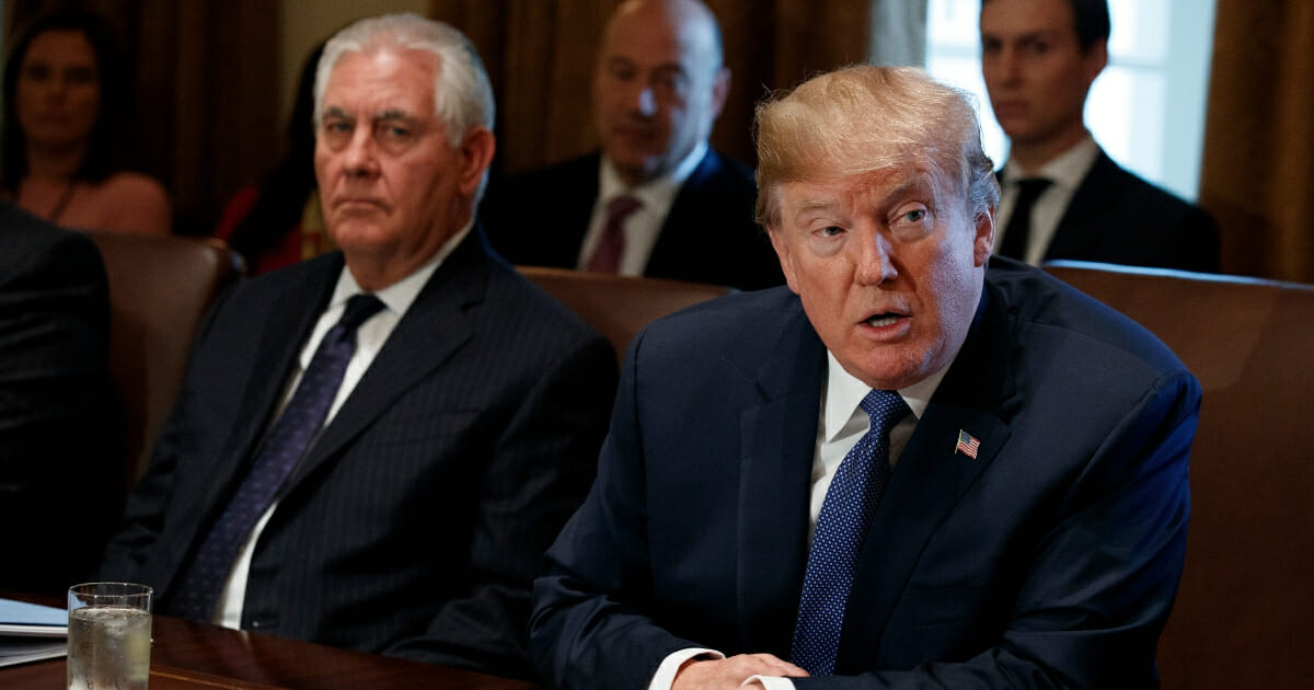 Then-Secretary of State Rex Tillerson listens as President Donald Trump speaks during a Cabinet meeting at the White House on Nov. 1, 2017, in Washington. (Evan Vucci / AP Photo)