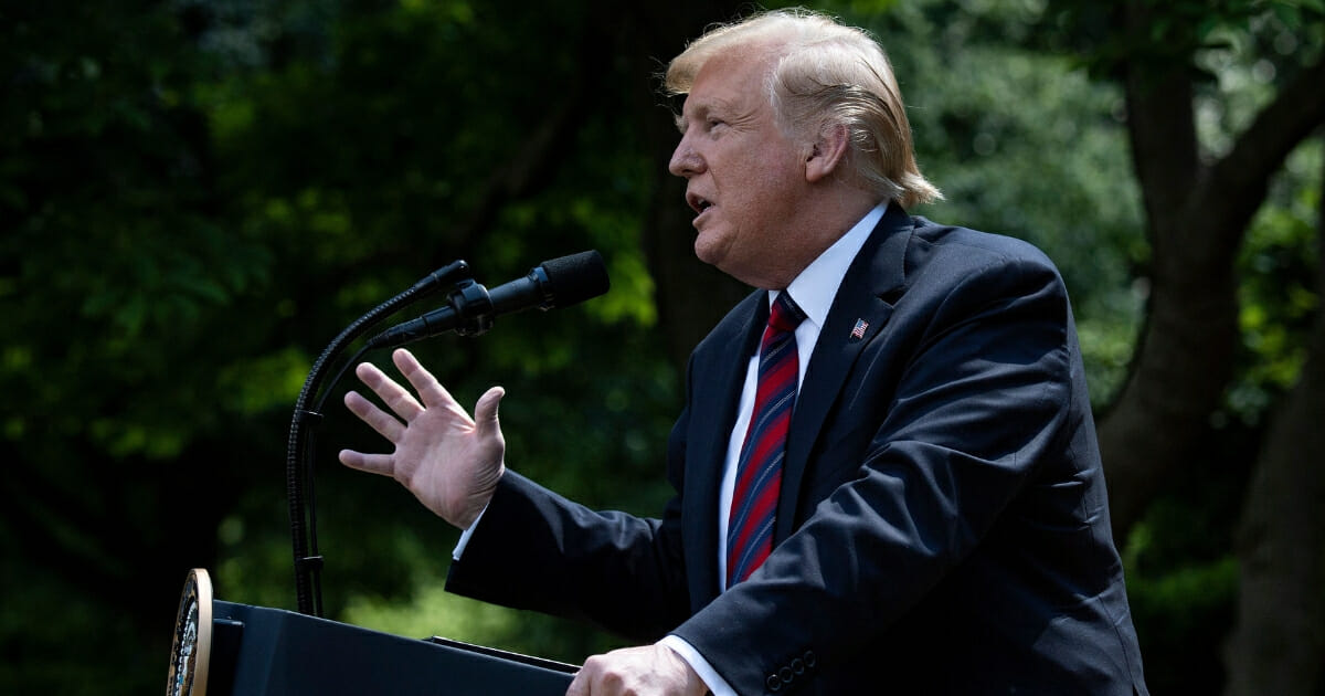 President Donald Trump gestures as he announces a new immigration proposal, in the Rose Garden of the White House in Washington, D.C., on May 16, 2019. (BRENDAN SMIALOWSKI / AFP / Getty Images)