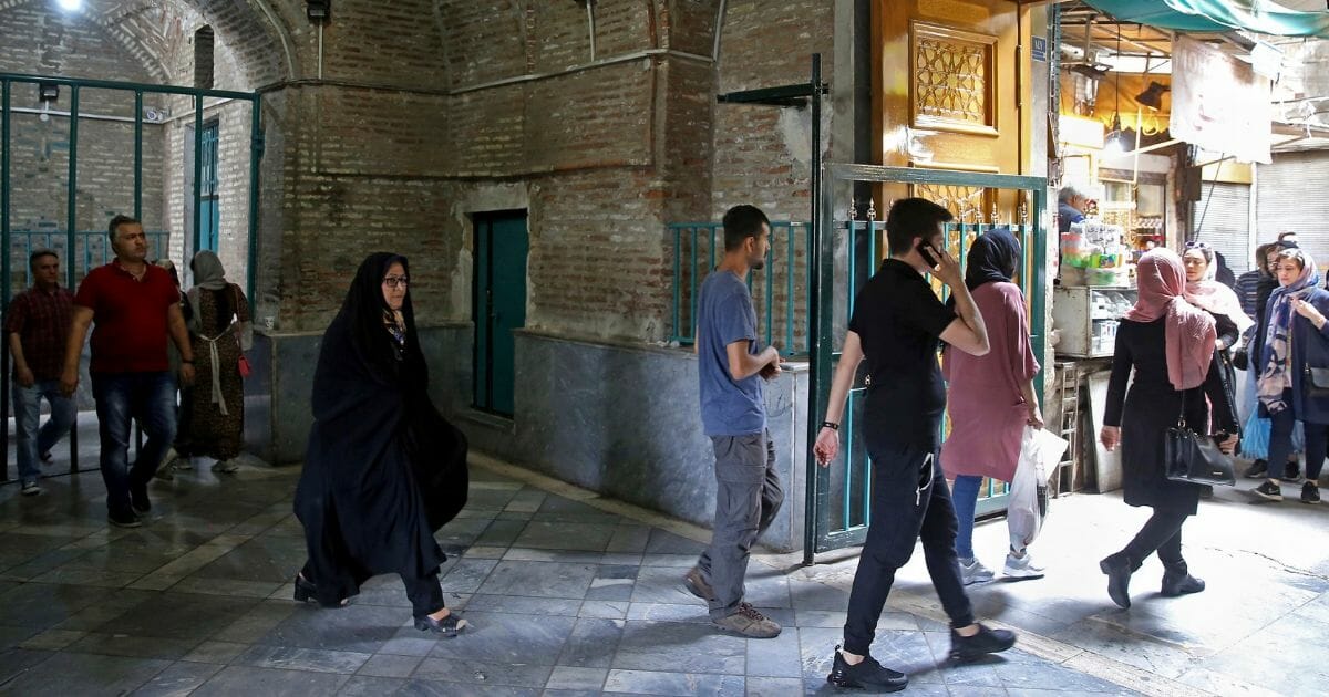 Shoppers stroll through the old main bazaar in Tehran, Iran, on May 8, 2019. The U.S. withdrew from the the 2015 nuclear deal and restored sanctions on Iran.