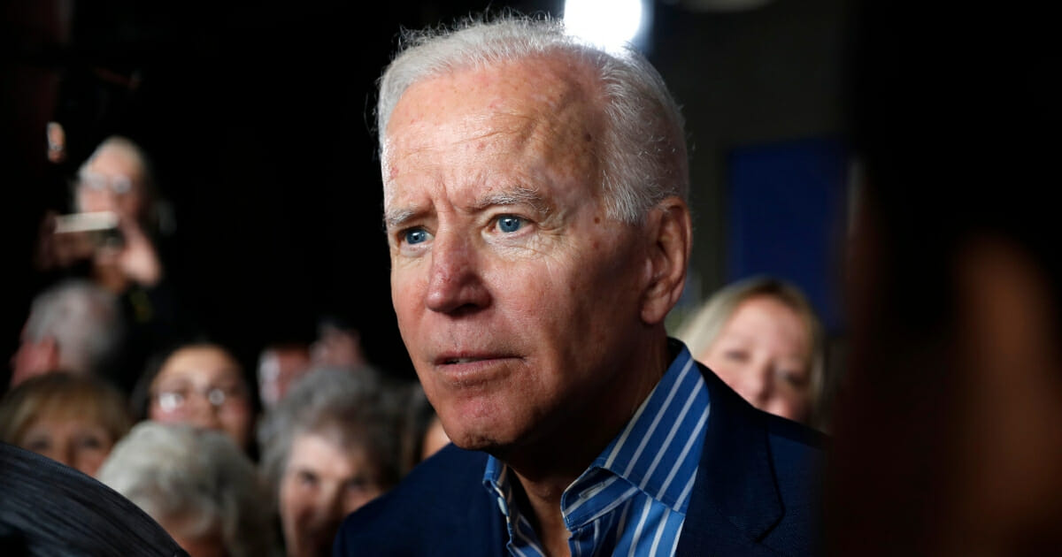Democratic presidential candidate Joe Biden greets audience members during a rally in Iowa City, Iowa, on May 1, 2019.