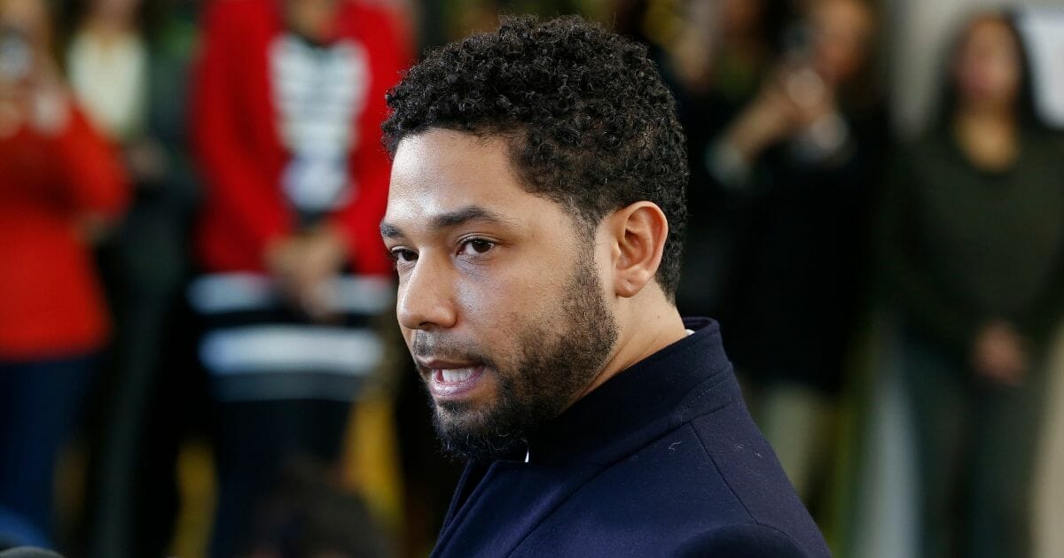 Actor Jussie Smollett speaks with reporters on March 26, 2019, in Chicago, Ill.
