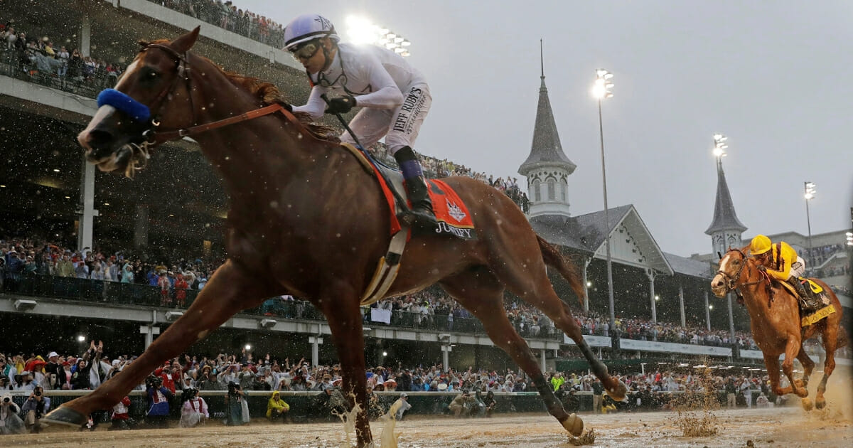 Mike Smith rides Justify to victory in the 144th running of the Kentucky Derby at Churchill Downs on May 5, 2018.