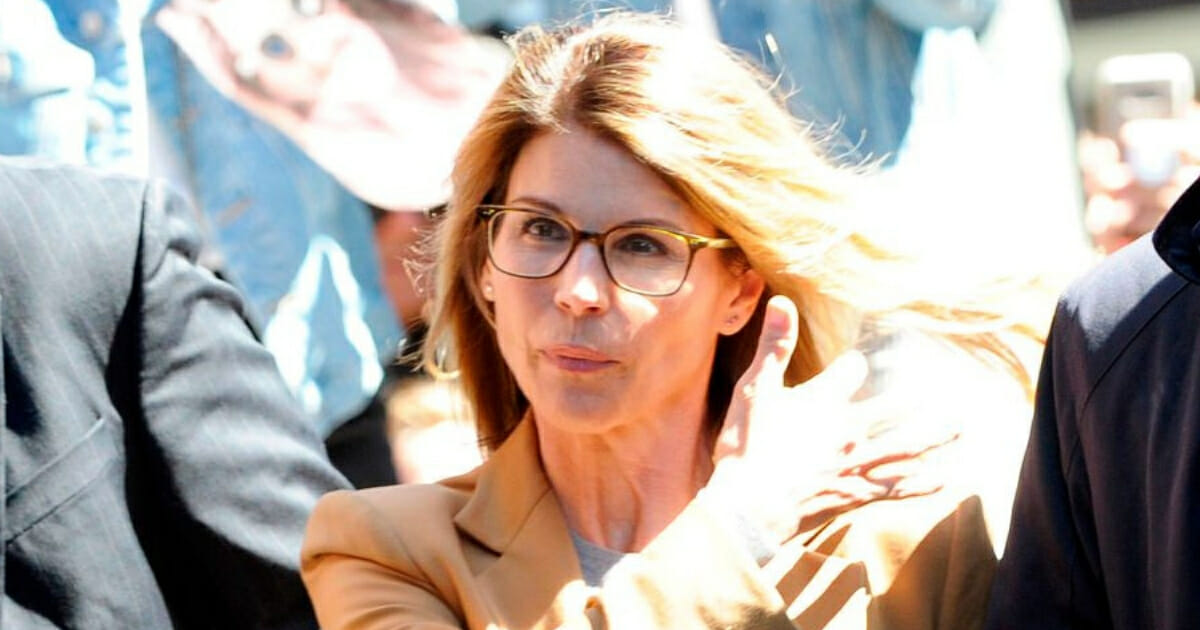 Actress Lori Loughlin arrives at the John Joseph Moakley United States Courthouse in Boston, Mass., on April 3, 2019.
