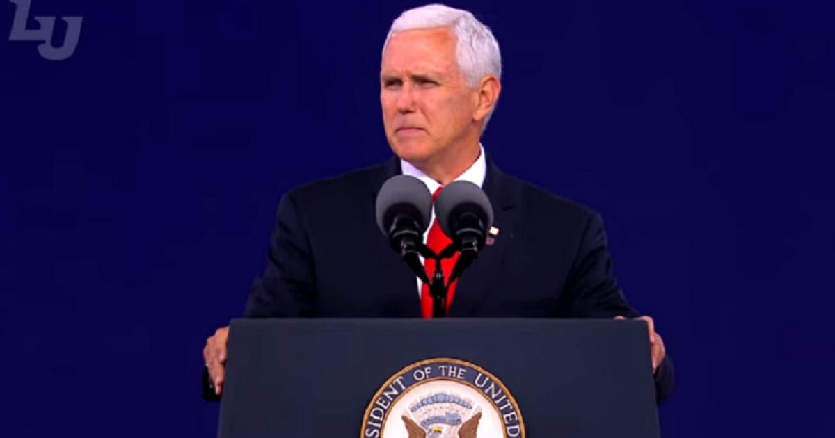 Vice President Mike Pence delivers a commencent address Saturday at Liberty University.