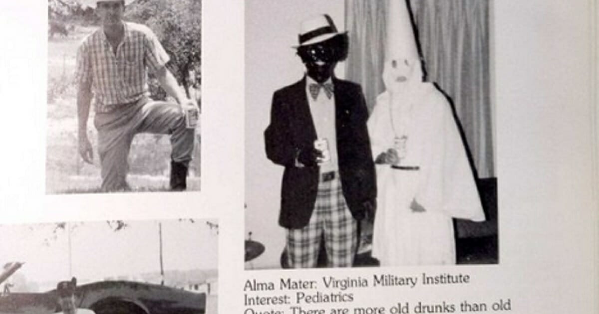 Photo from Virginia governor's yearbook shows a man in blackface and another in a KKK robe and hood.