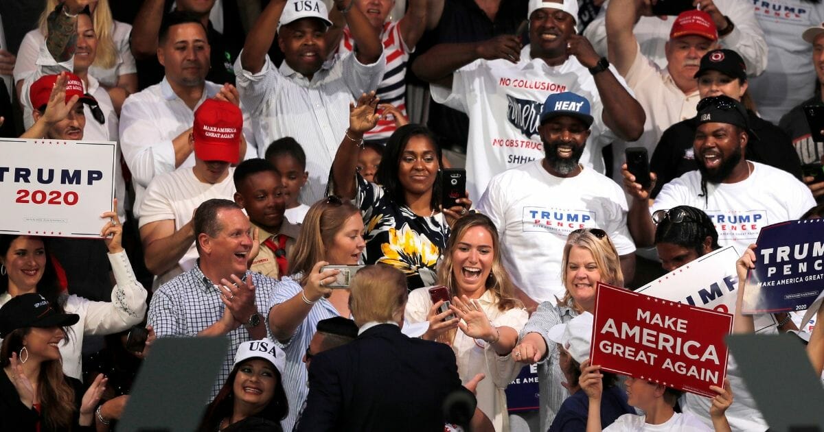President Donald Trump greets a wide range of supporters as he arrives to speak at a rally in Panama City Beach, Fla., on May 8, 2019.